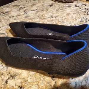 Black pointed Rothy shoes